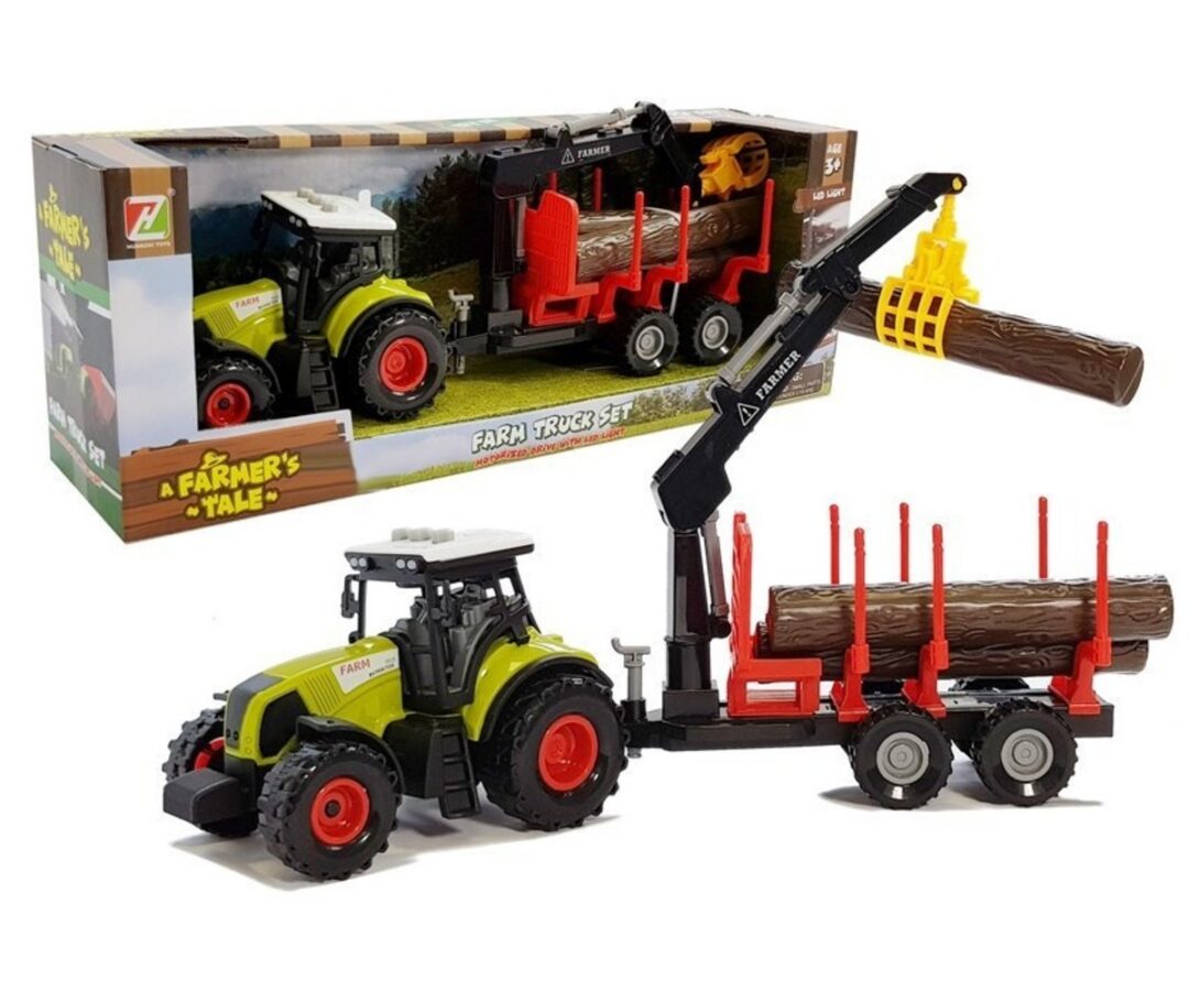 Mängutraktor metsaveohaagise ja kraanaga koos kolme palkiga.