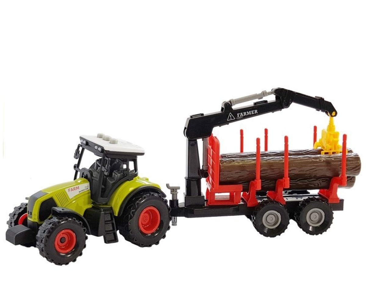 Mängutraktor metsaveohaagise ja kraanaga, kraana tõstmas palki.